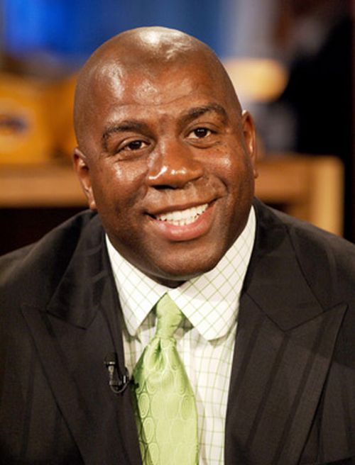 Earvin "Magic" Johnson sells his share in the Lakers and 103 Starbucks