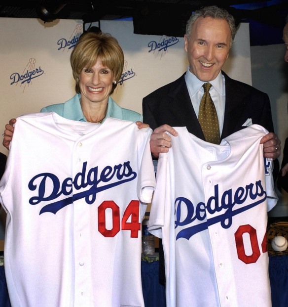 Frank McCourt and ex-wife - Guggenheim Baseball Partners which includes Magic Johnson will buy the Los Angeles Dodgers for $2 billion - twice the amount ever paid for a baseball franchise